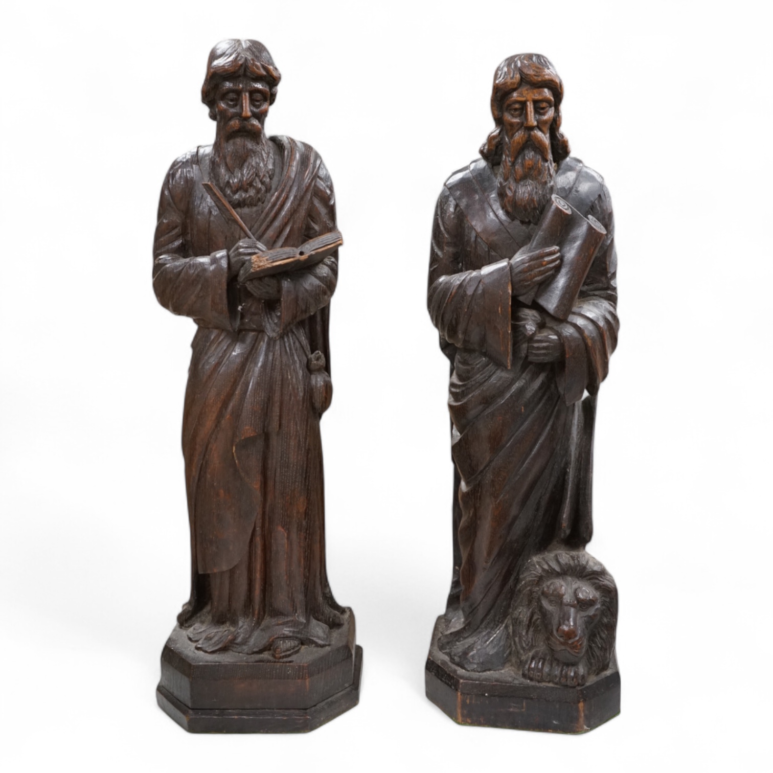 Two 19th century carved wood figures of standing scribes, 67cm